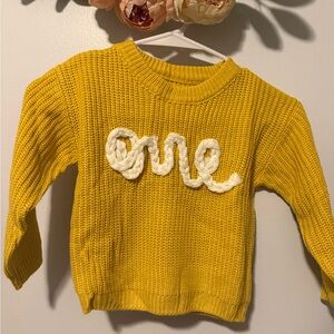 Amazon Kids Yellow Sweater with White Text